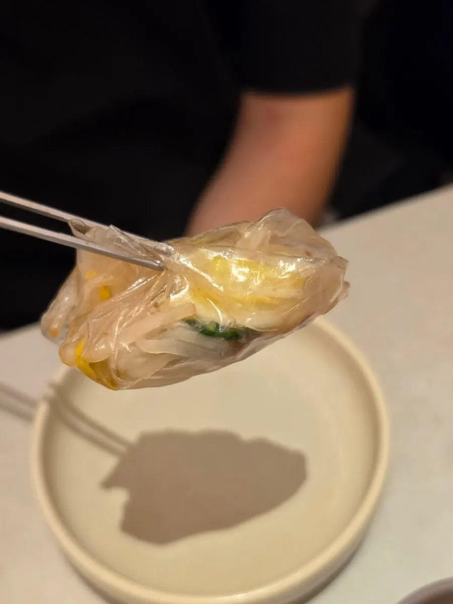 Rice paper wrap filled with vegetables and meat
