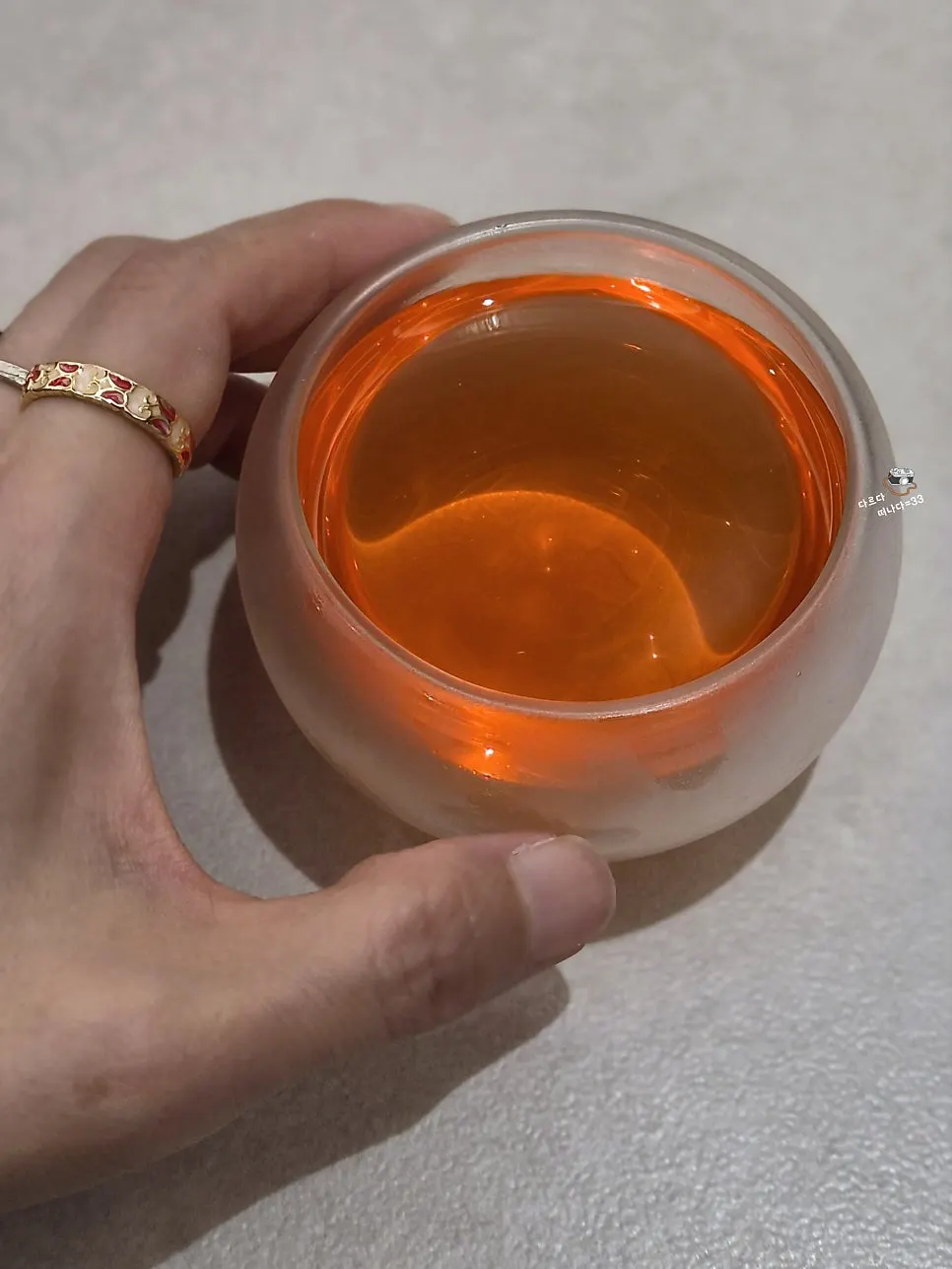 Reddish omija tea served for dessert