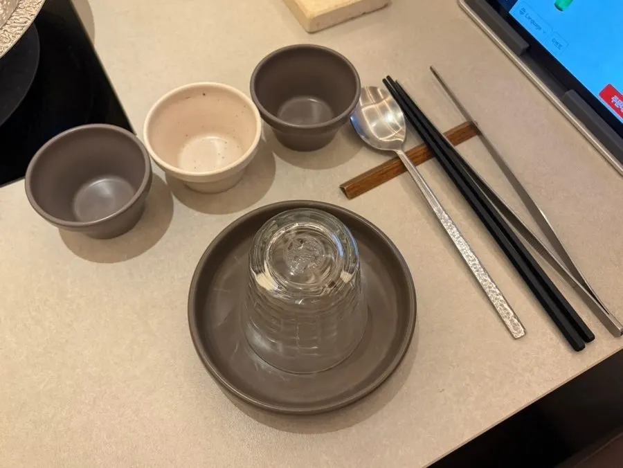 Table setting with individual tongs for each guest