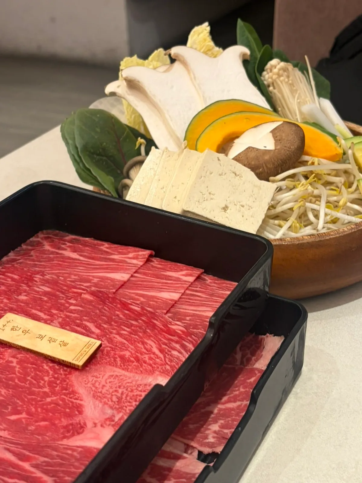 Full spread of the shabu set with blue crab miso broth