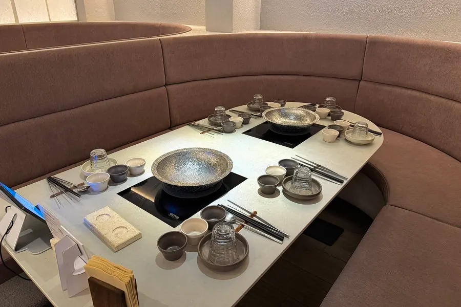 Full view of the dining hall with group tables at Shabu in Seoul Hapjeong Branch