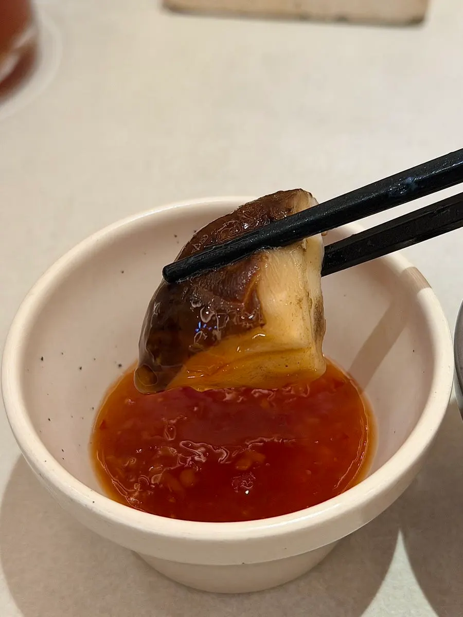 Prime Angus chuck flat cooked in the broth