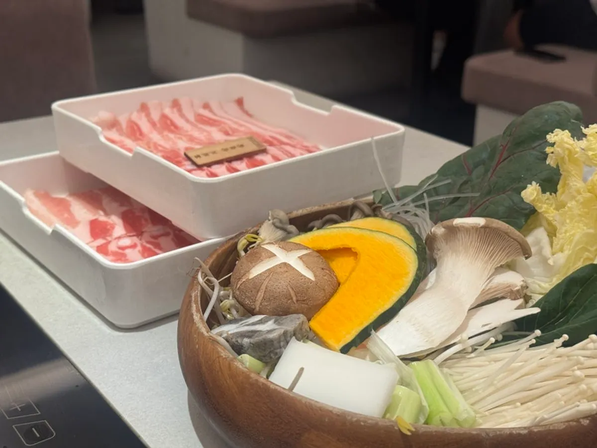 Vegetable basket with napa cabbage, bok choy, sweet pumpkin, and mushrooms
