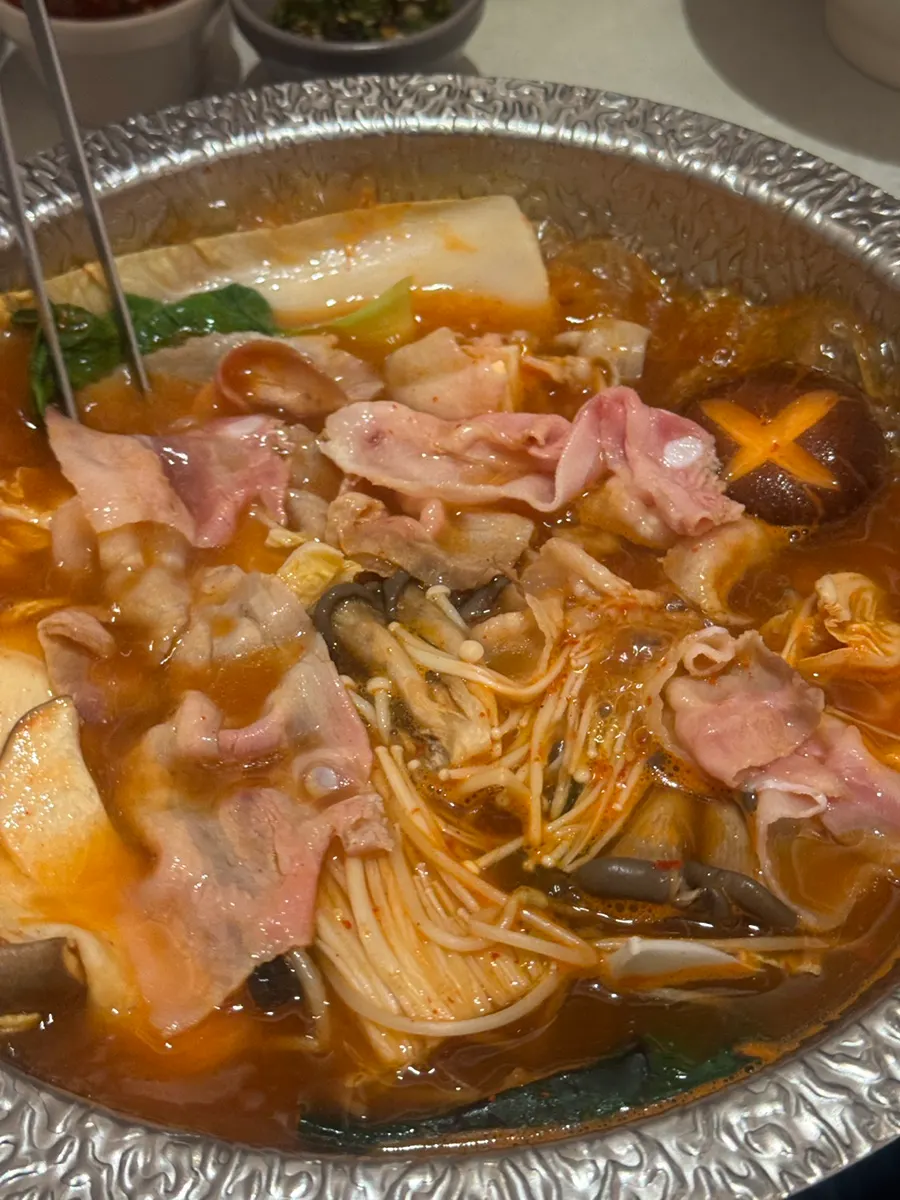 A piece of beef cooked in the broth