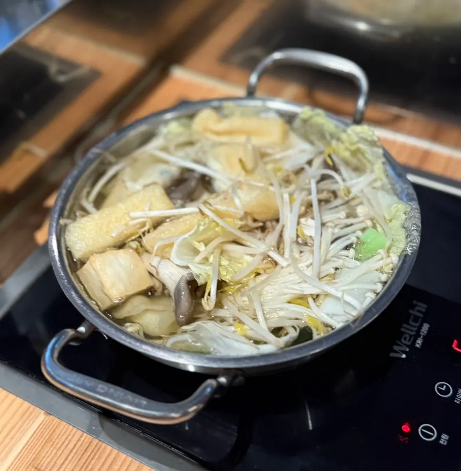 Vegetables and meat added to the clear broth