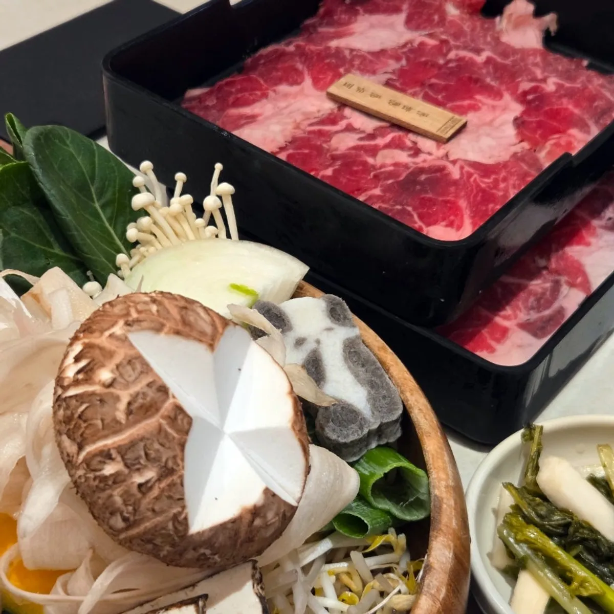 Full spread of prime Angus chuck flat and sukiyaki