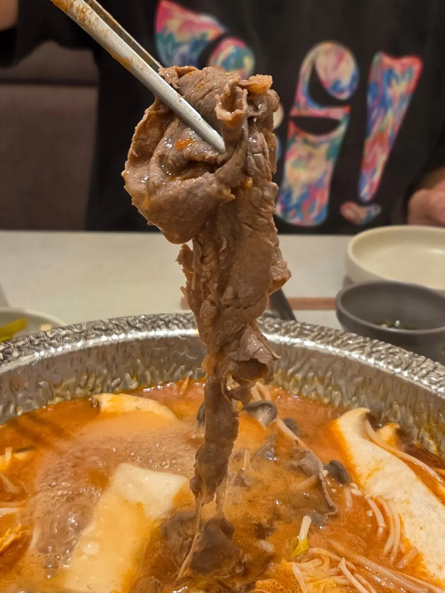Shabu-shabu meat dipped in sauce