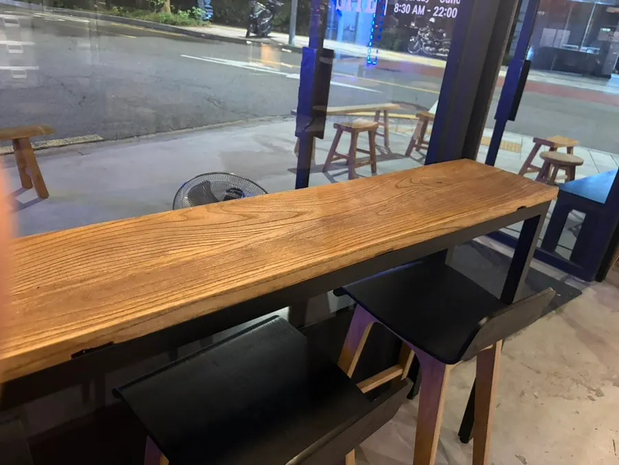 Interior of Central Site Hapjeong with wood tables