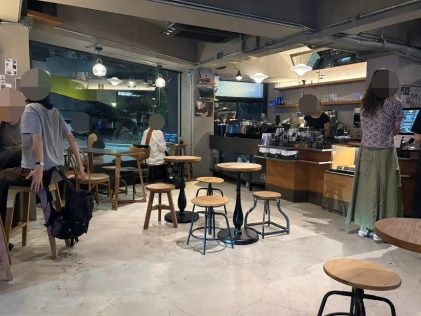 Wide view of the spacious, clean café interior seating