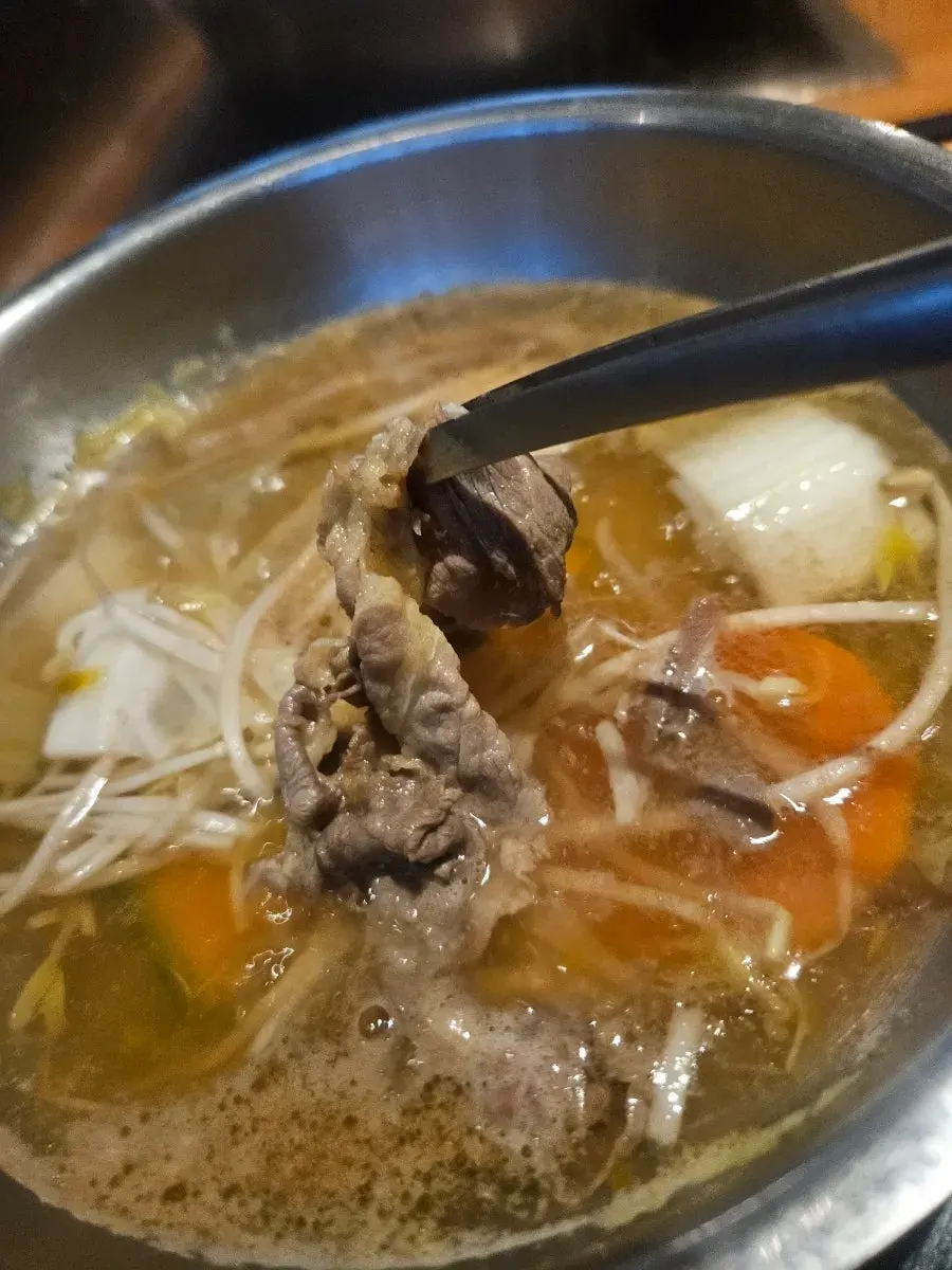 Cooked shabu-shabu meat and vegetables