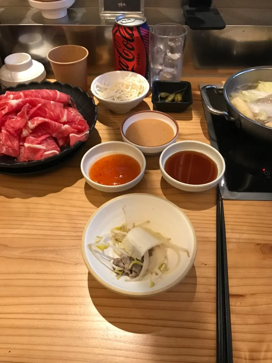 Meat and vegetables cooking in the solo pot