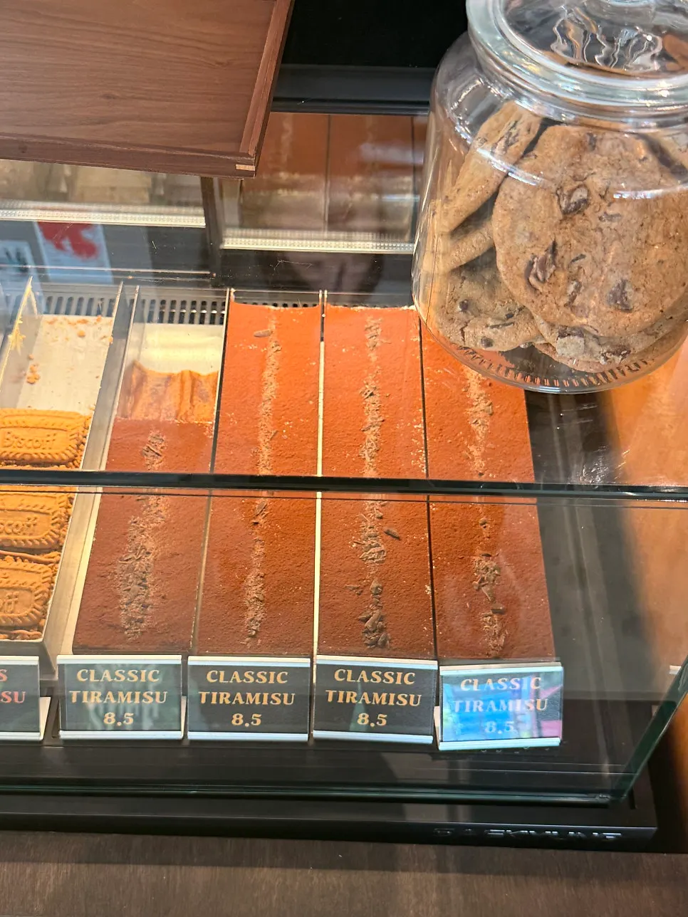 Classic, brownie, and Lotus tiramisu on display