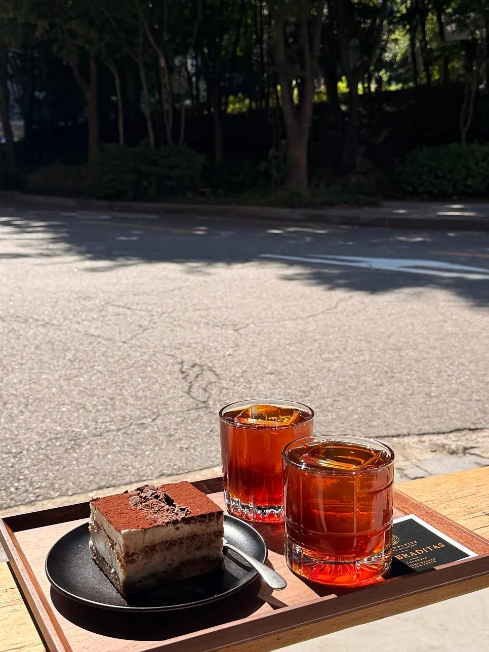 Drip coffee served with its description card