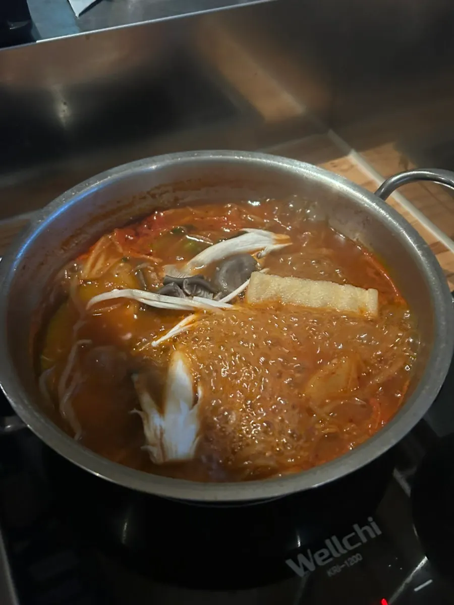 Personal pot with vegetables and fried tofu