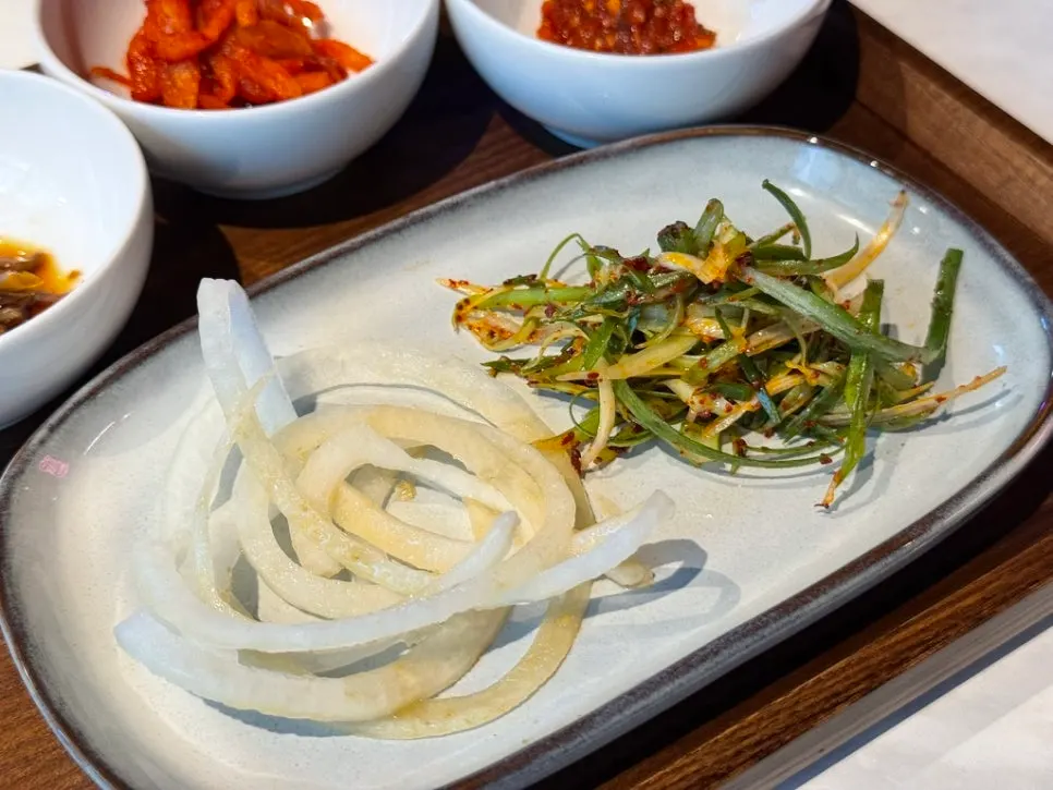 Single-serving tray with gochu-ji, musaengchae, and squid jeotgal