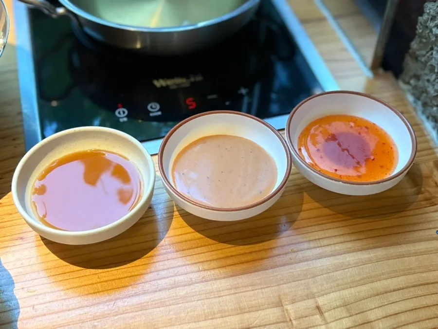 Meat and vegetables cooking in boiling clear broth