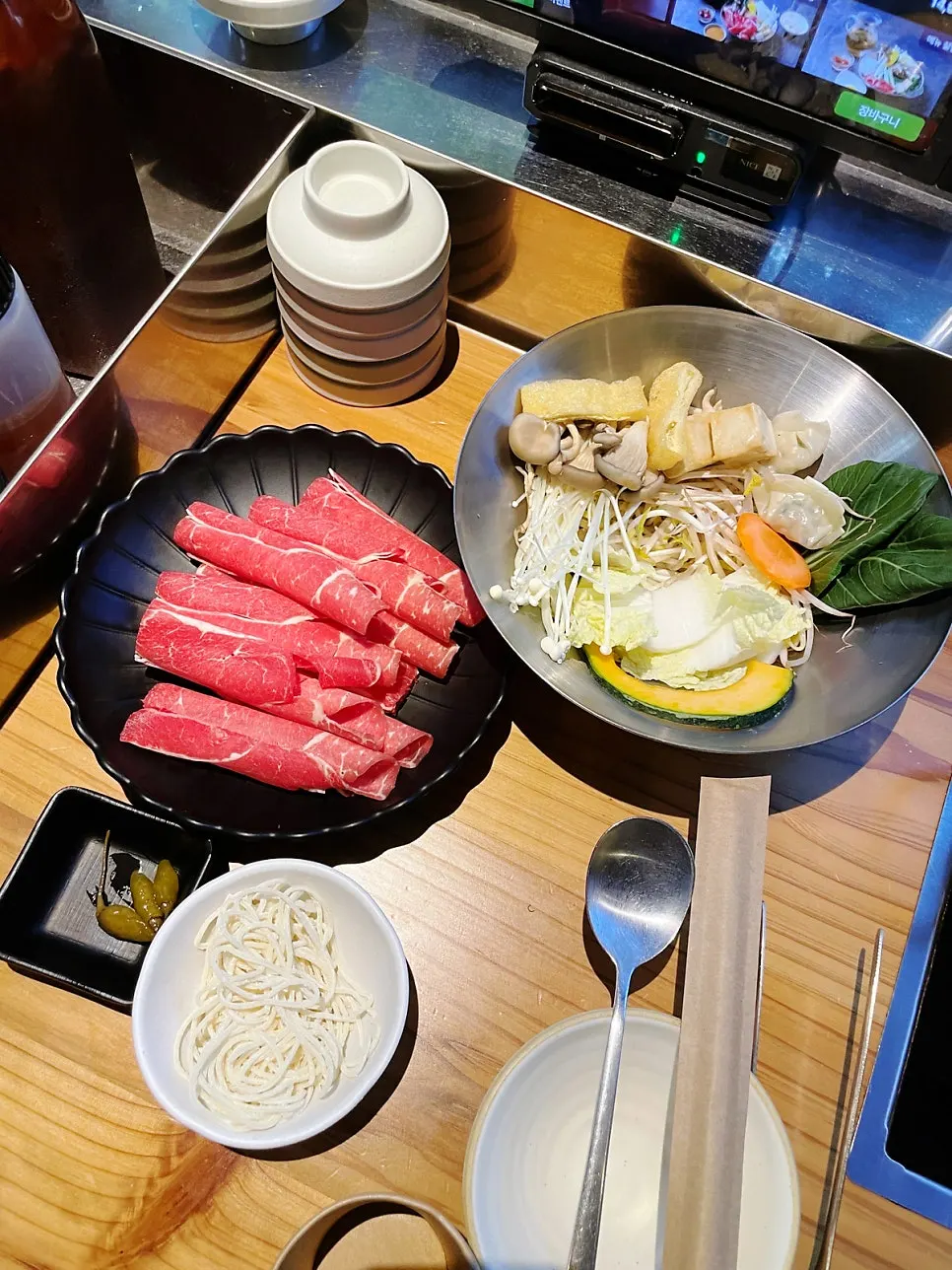 A table setup ideal for solo shabu-shabu