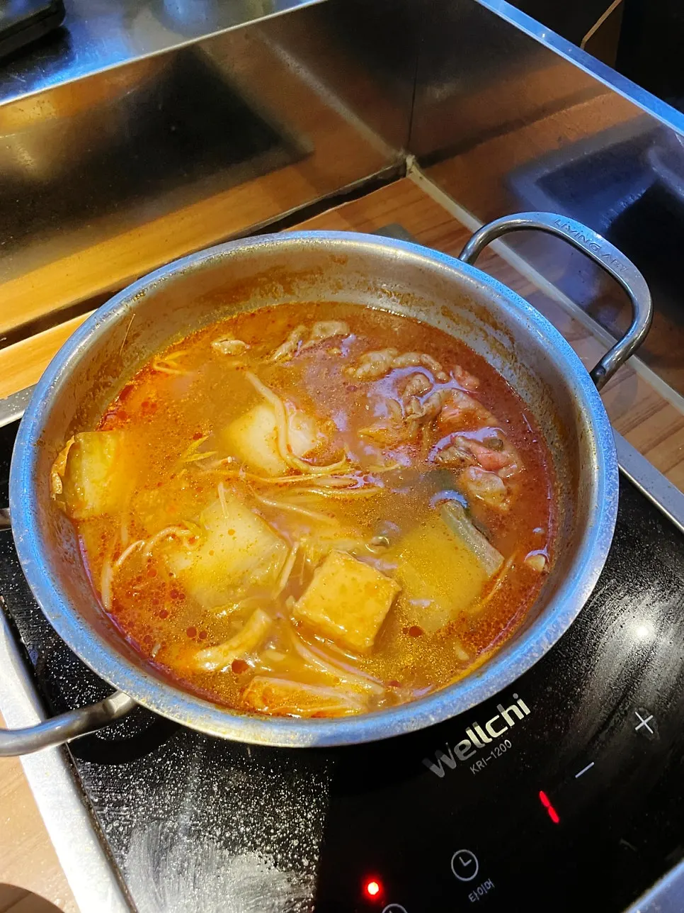 Cooking ingredients in the tomato broth