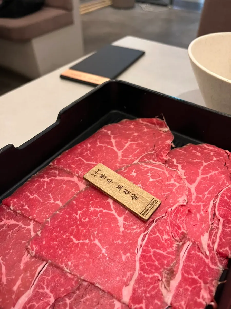Shabu-shabu meat cooked in sukiyaki broth