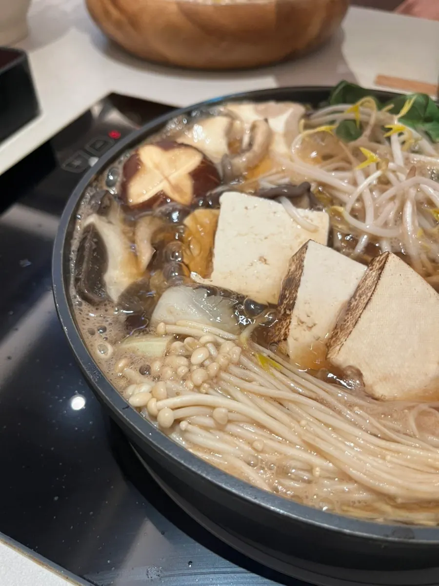 Vegetables cooking in sukiyaki broth