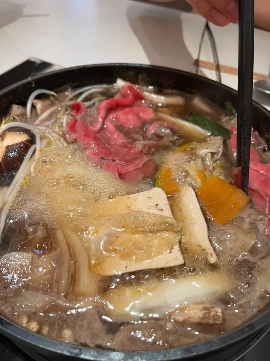 Sukiyaki shabu-shabu served with egg