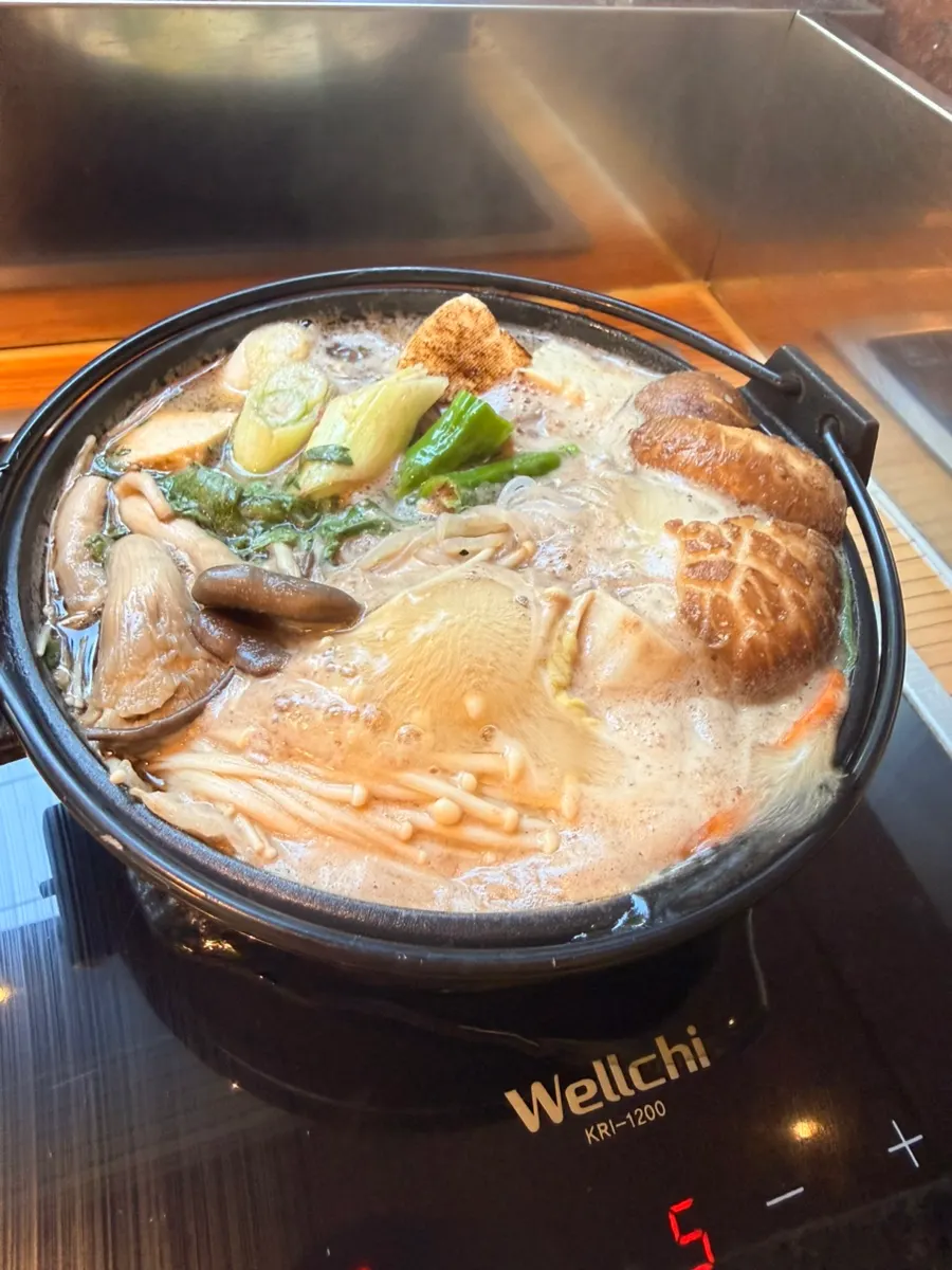 The sukiyaki pot starting to boil
