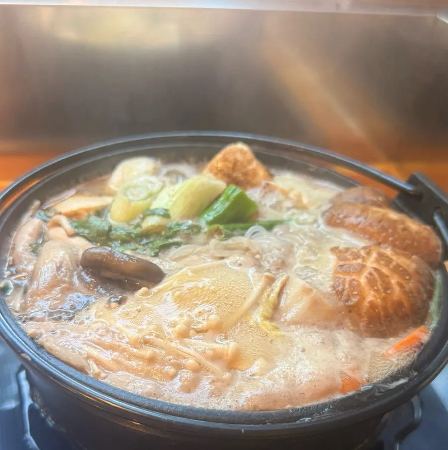 A sukiyaki pot filled with broth