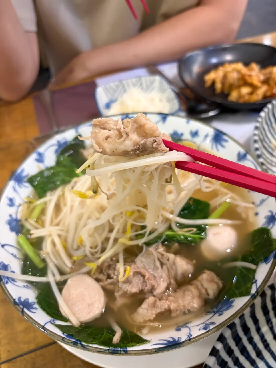 Thai rice noodle soup with meat and fish balls