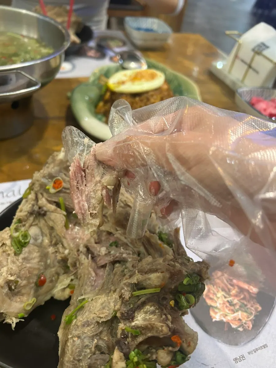 Meat pulled off the bone from the leng saap