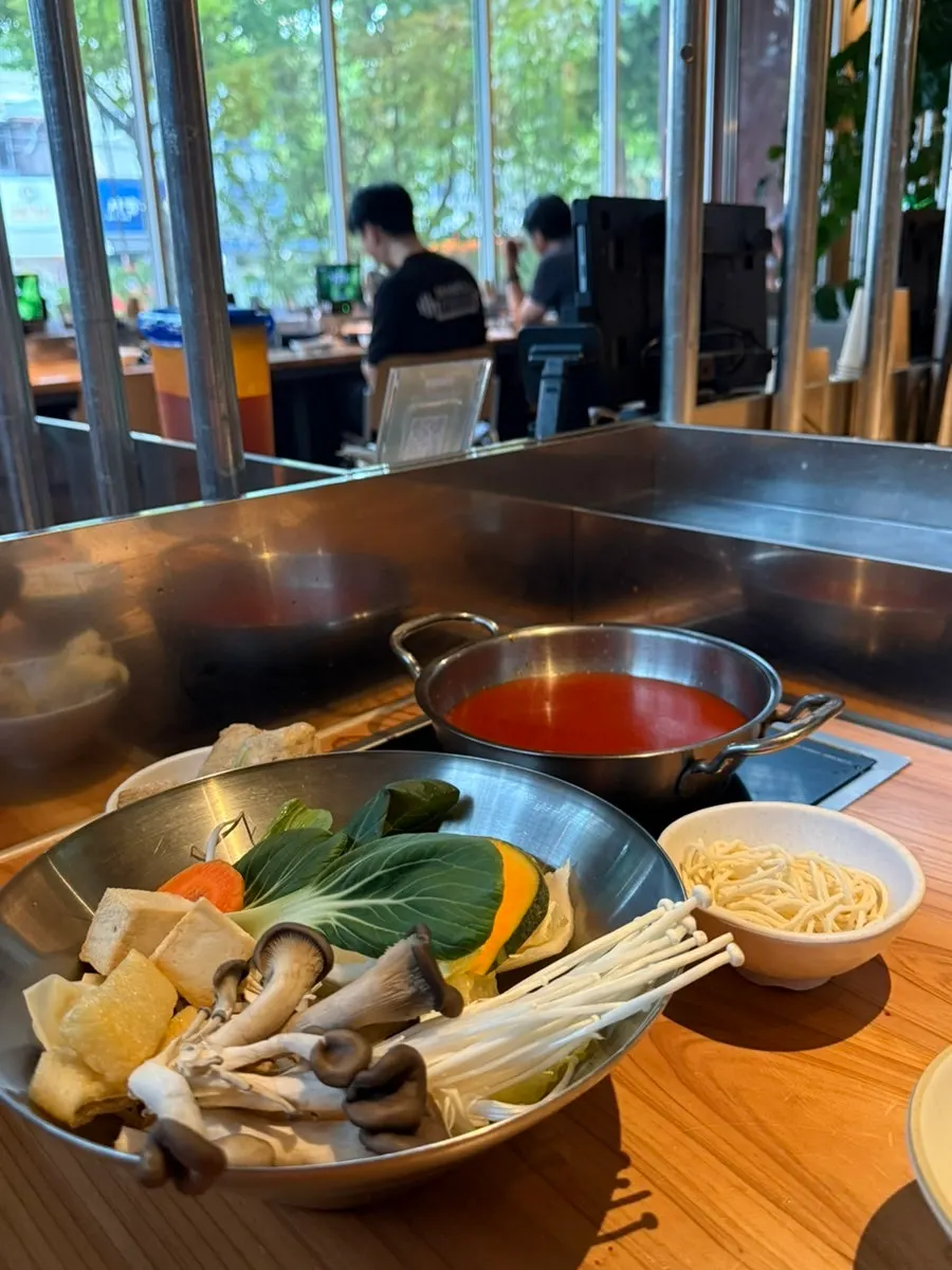 Tomato-broth shabu-shabu table setting