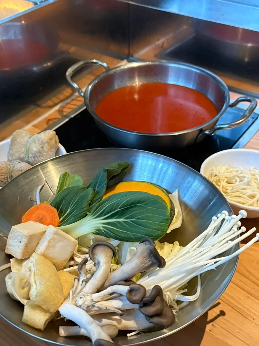 Tomato-broth ingredients and vegetables