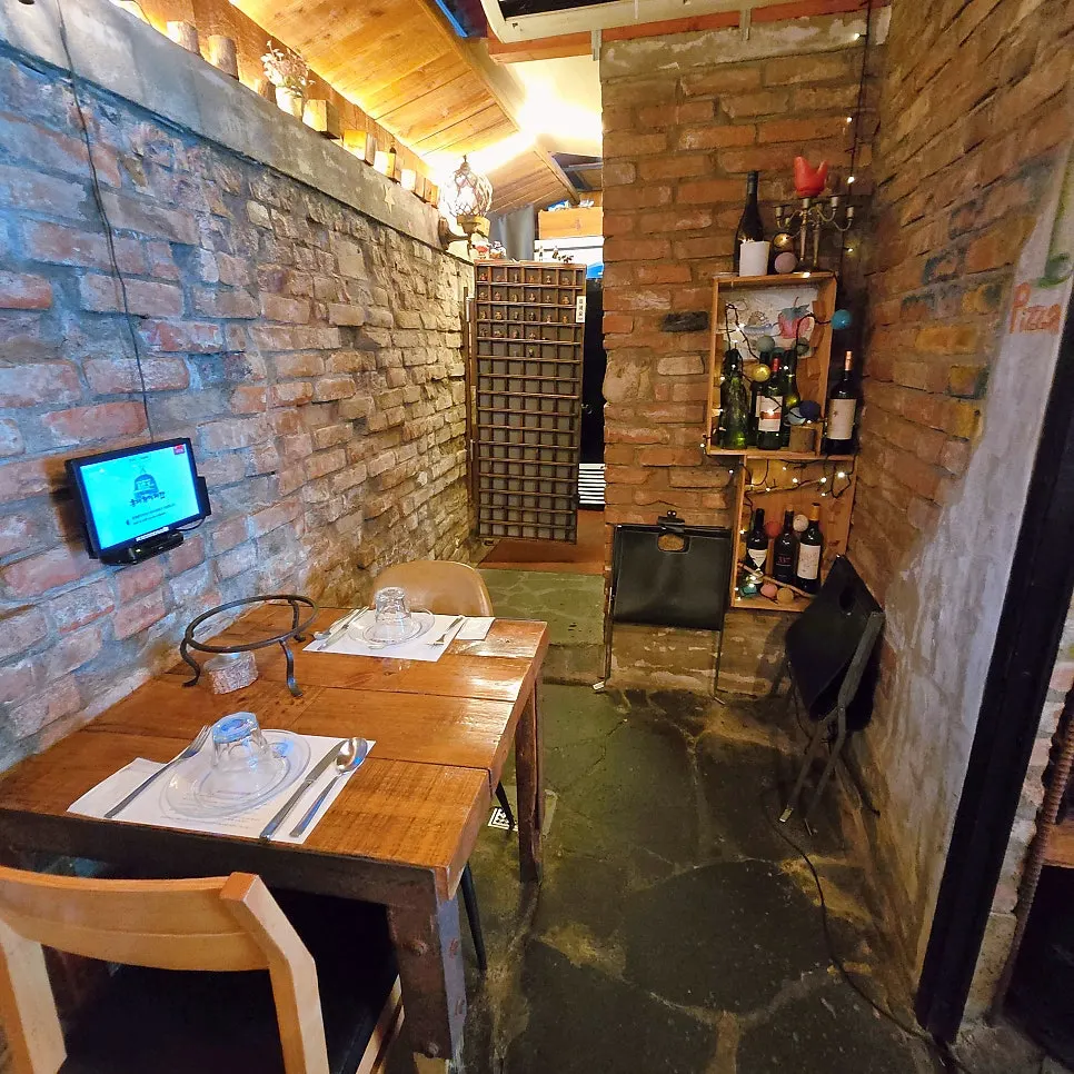 Wine props and exposed brick wall interior
