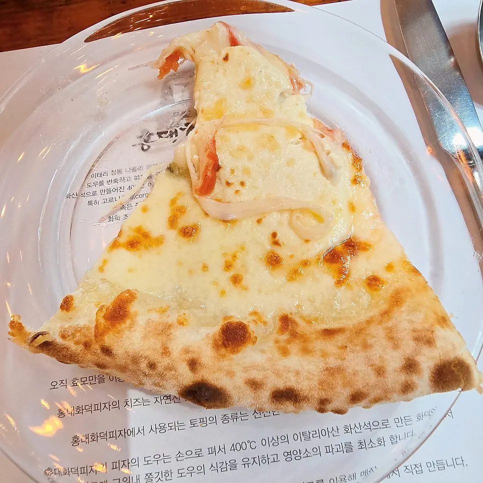 Table set with both pizza and pasta