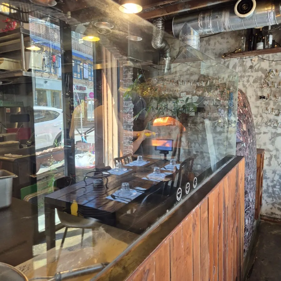 The wood-fired pizza menu board