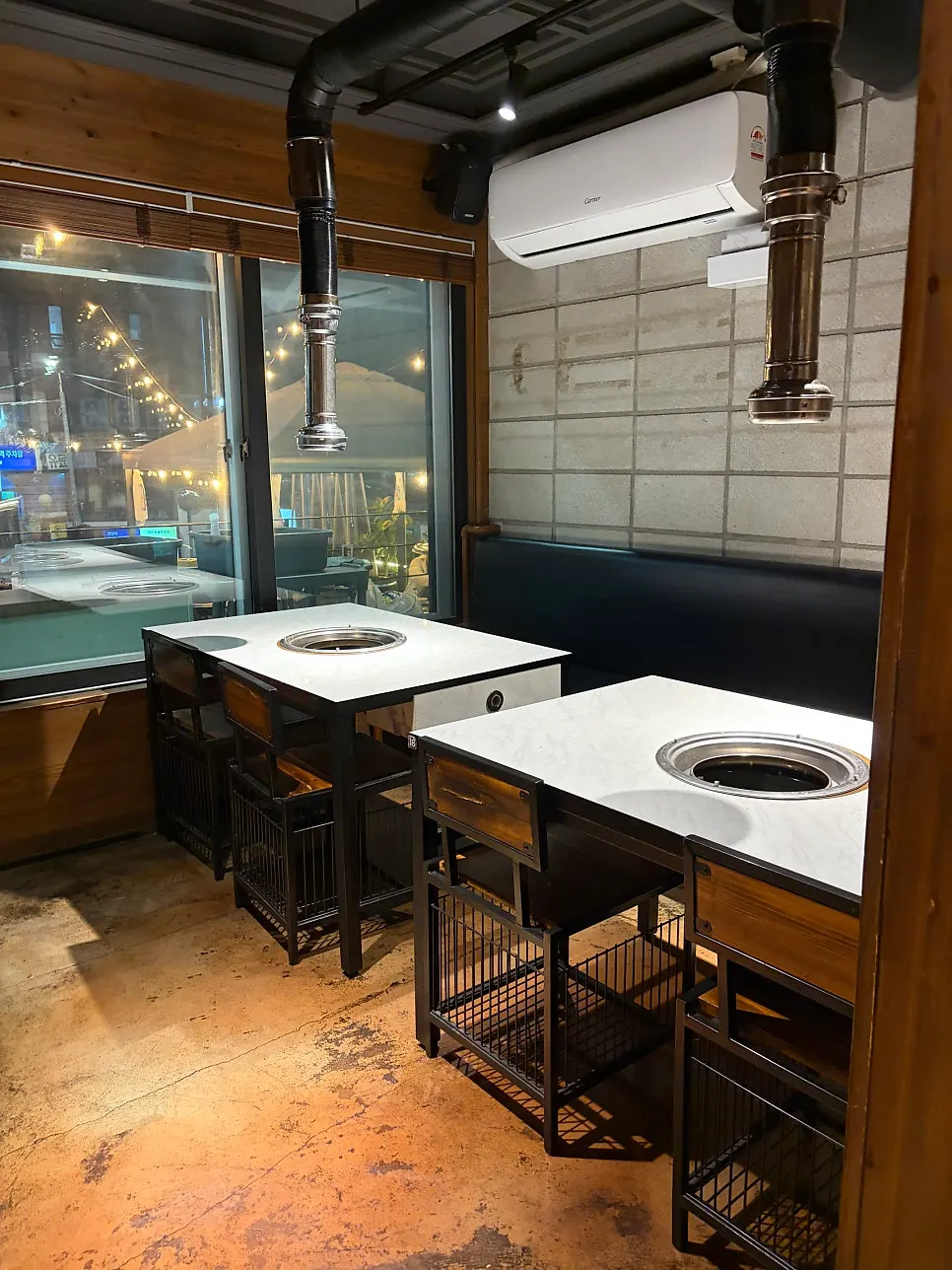 Indoor seating with multiple tables at Jeongyukdo