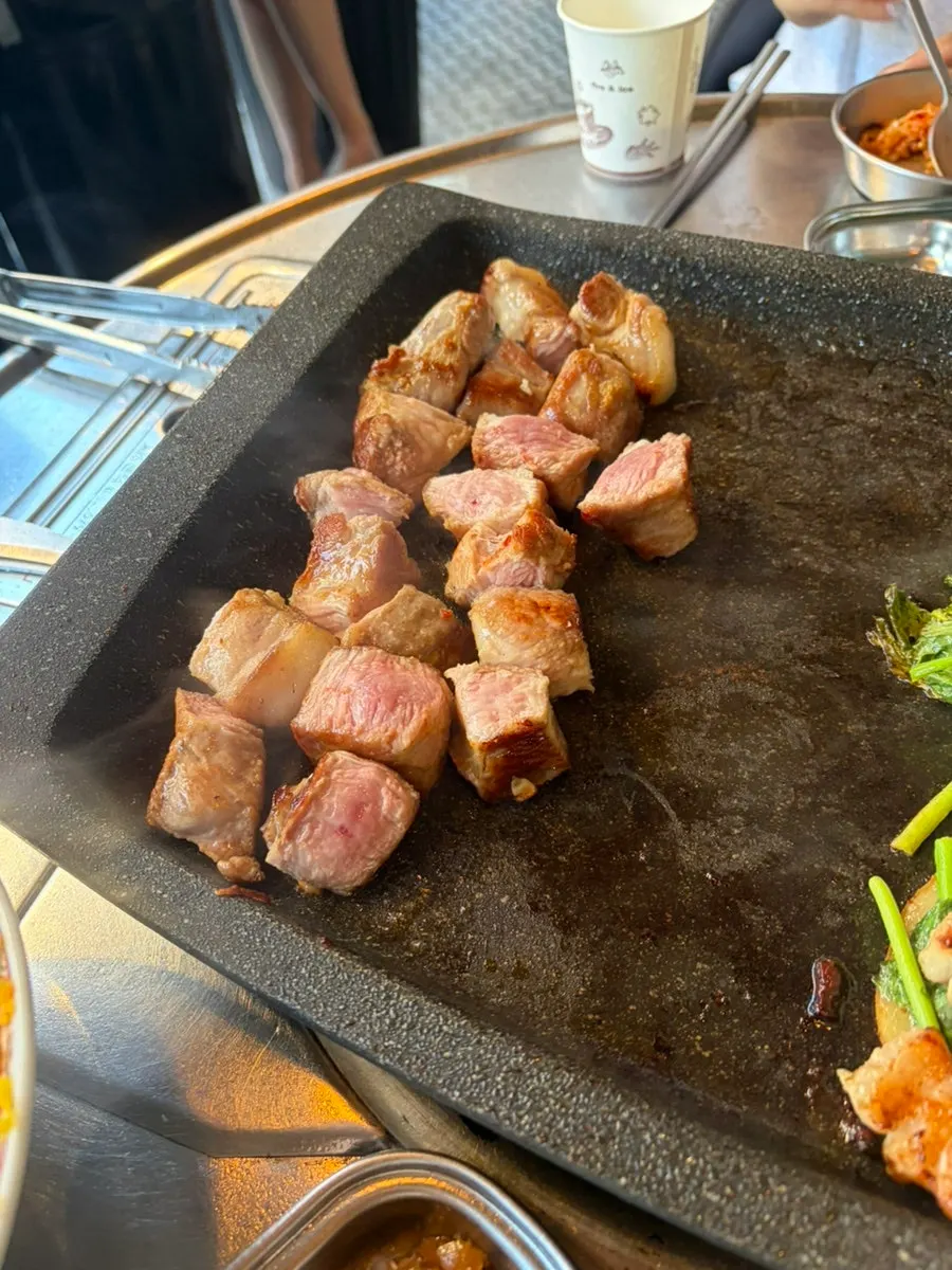 Cooked minari cut into bite-sized pieces