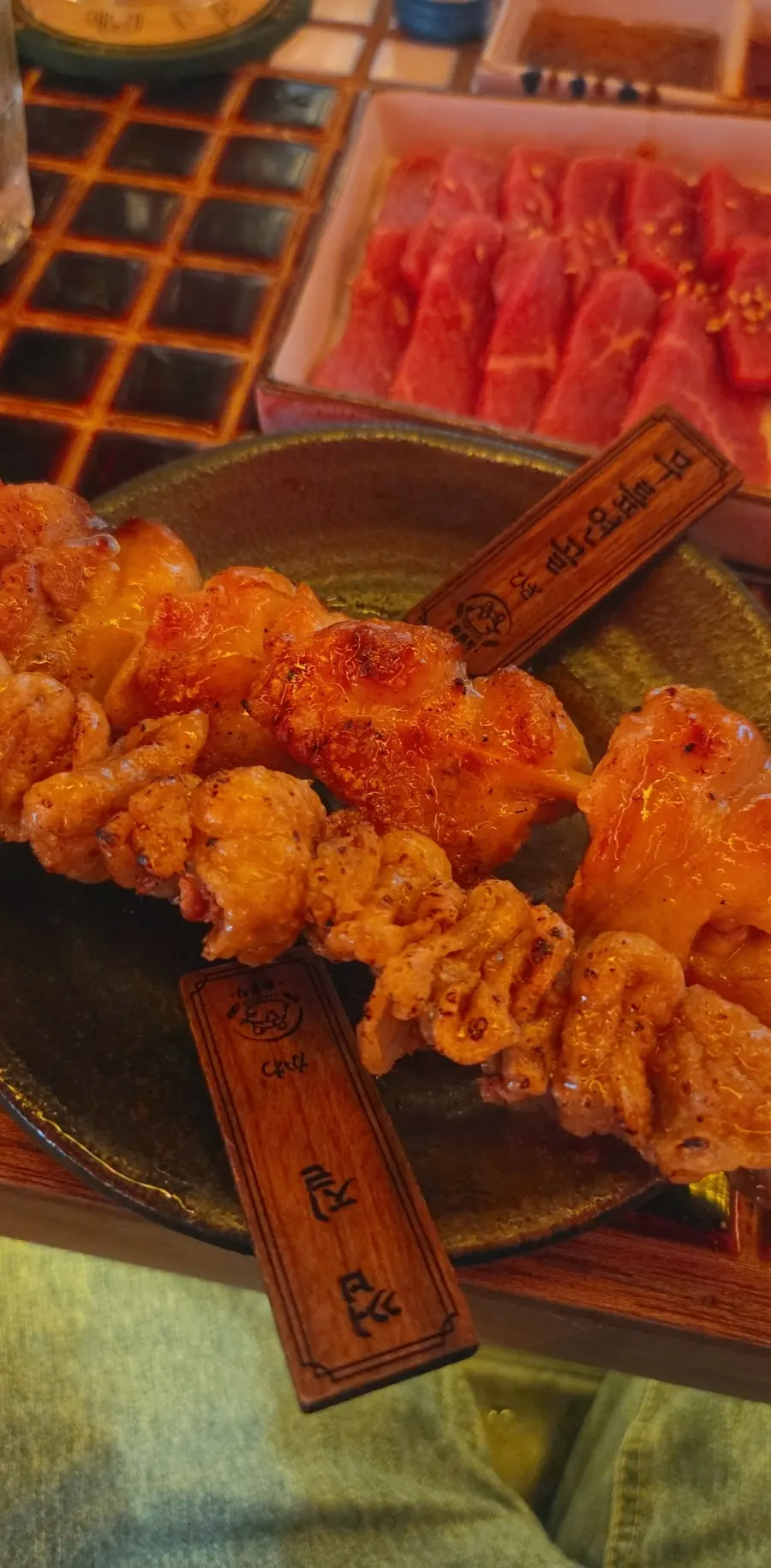 Freshly grilled yakitori skewers