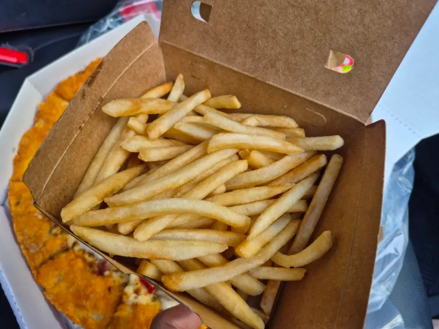 Crispy fries packed for takeout