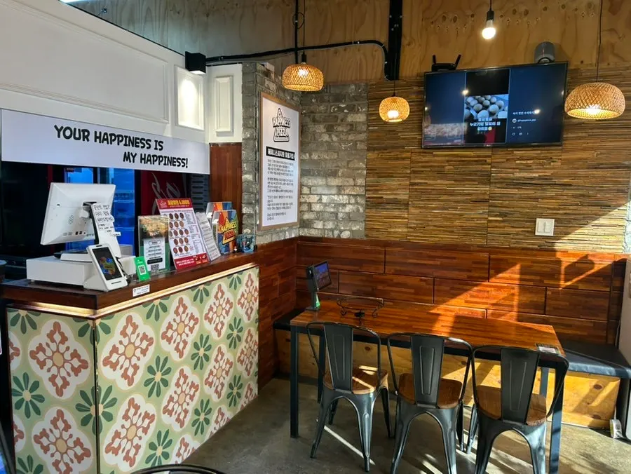 Neatly arranged interior of Happiness Pizza