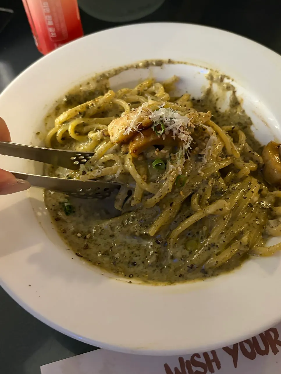 Pasta noodles coated in rich abalone guts sauce