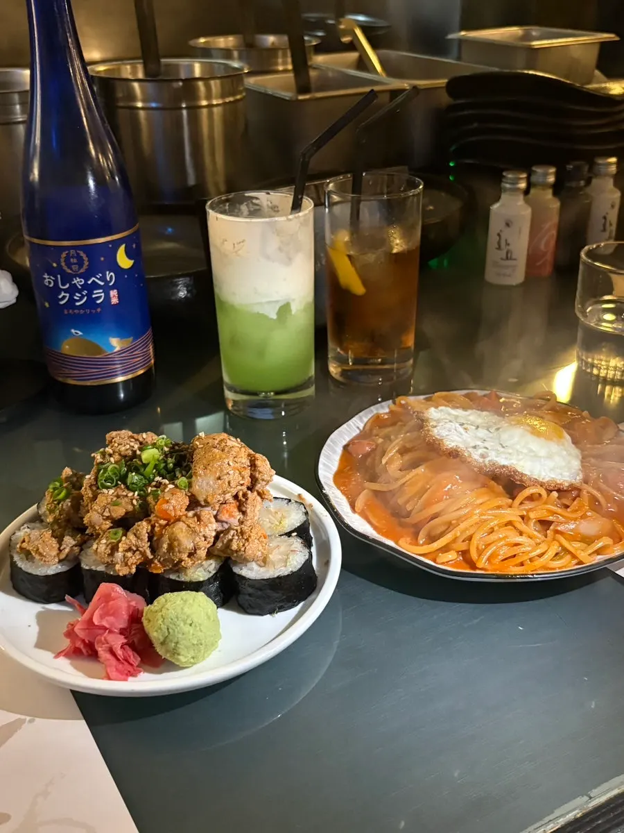 A plate of ankimo bomb salt gimbap piled high with ankimo