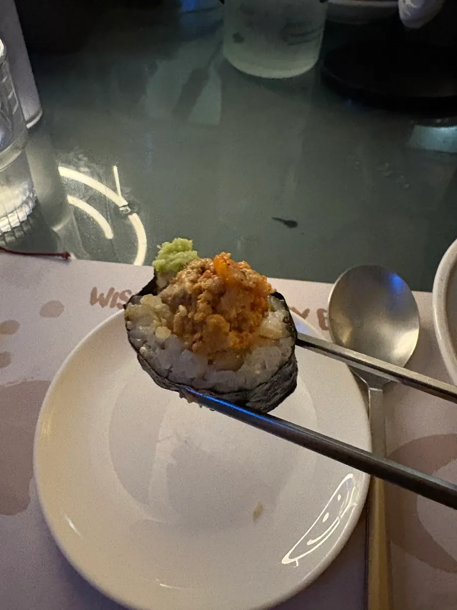 Ankimo bomb salt gimbap topped with wasabi