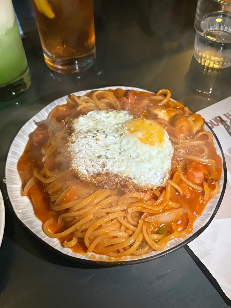 Japanese-style Napolitan pasta topped with a fried egg