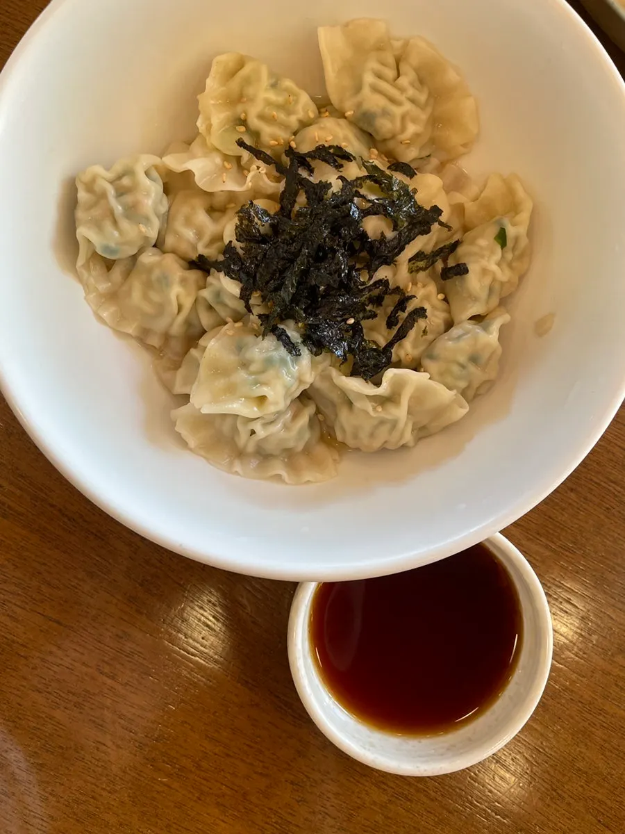 Jeyuk deopbap served in a galvanized steel pot