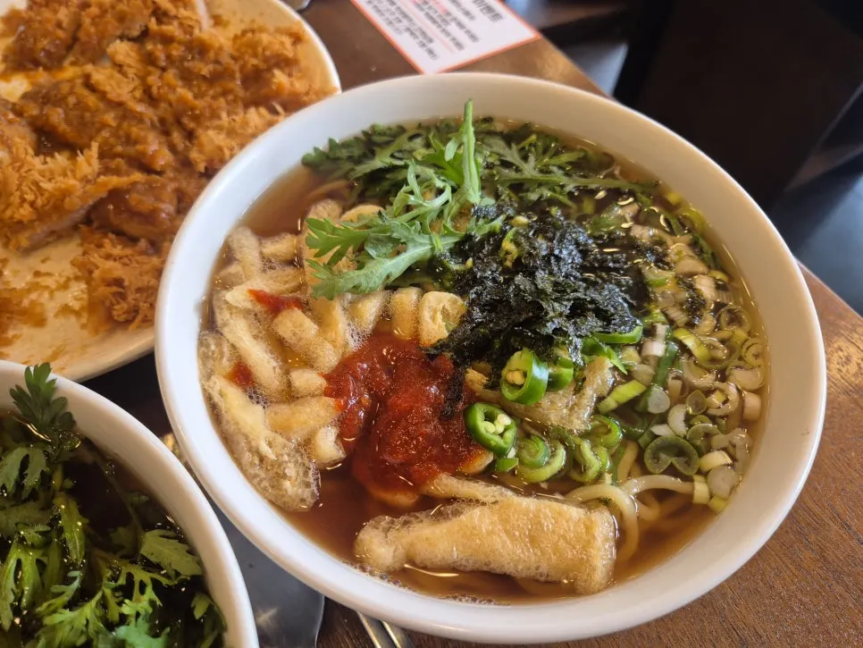 A bowl of spicy udon with a punchy broth
