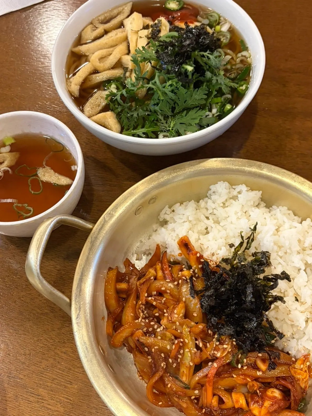 Spicy pepper udon and squid rice bowl set on the table