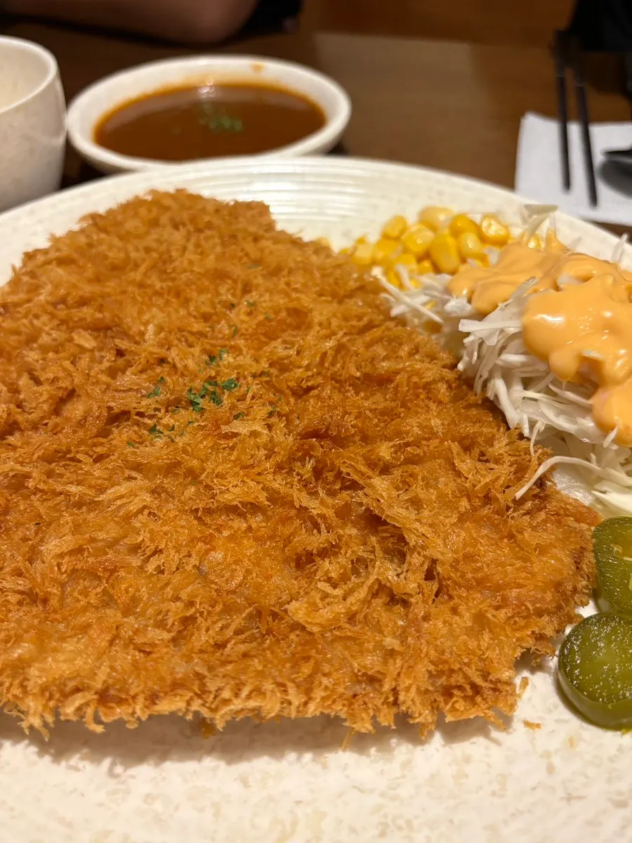 Old-style pork cutlet served with sauce