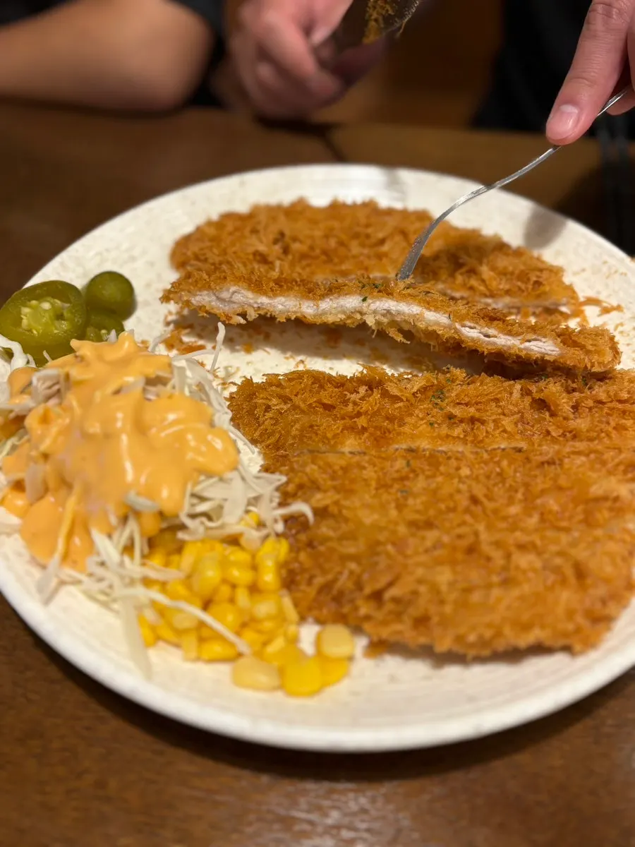 Cross-section of the crispy-battered pork cutlet