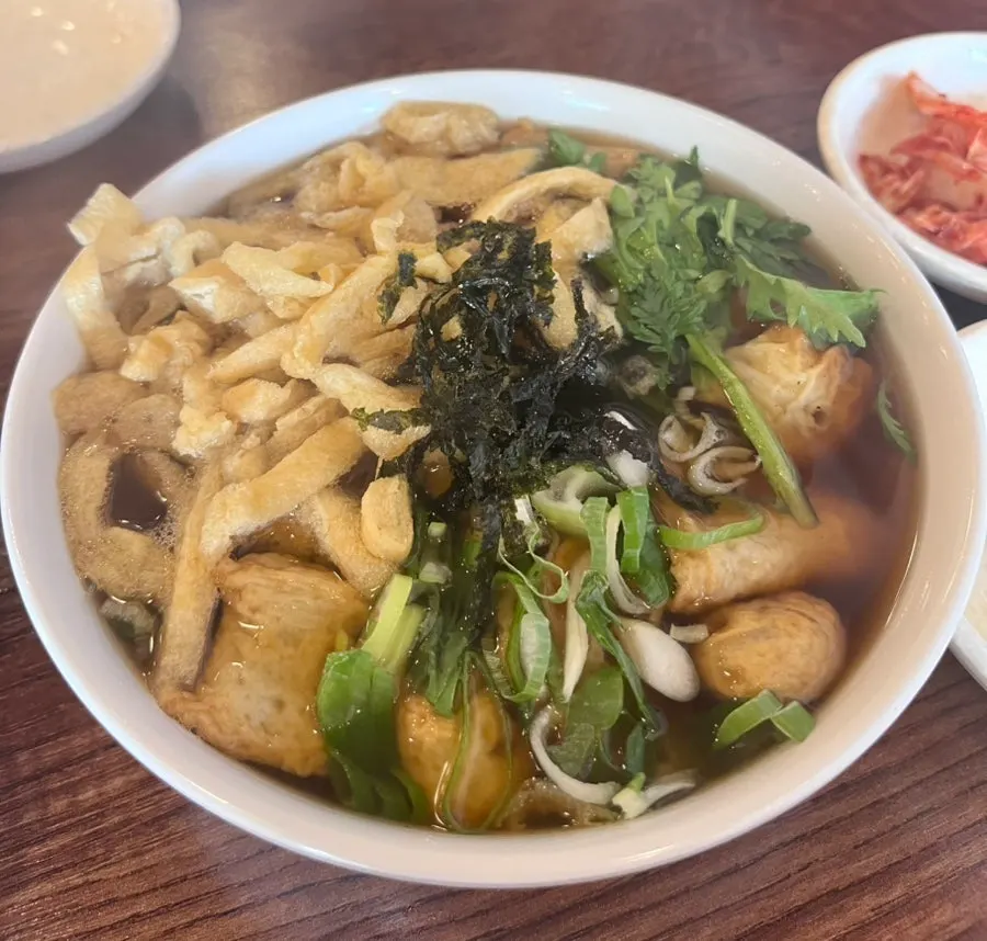 Fish cake udon topped with big chunks of fish cake