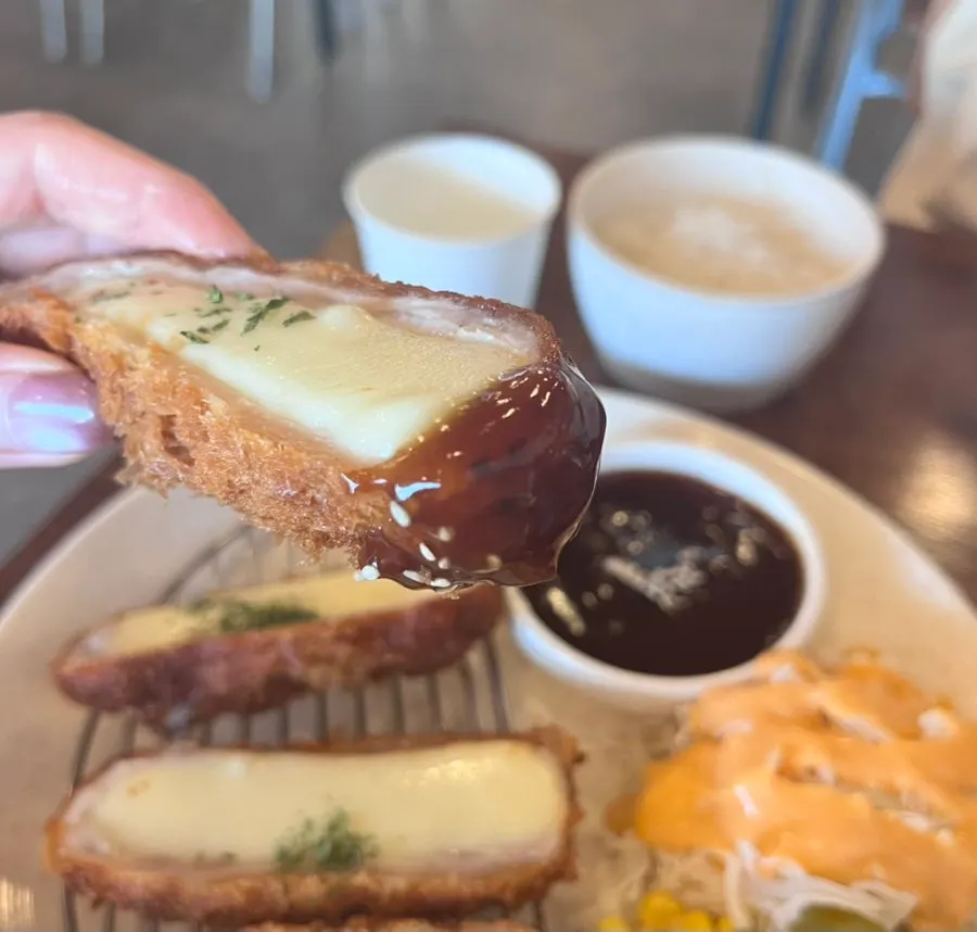 Plate of crispy fried cheese donkatsu